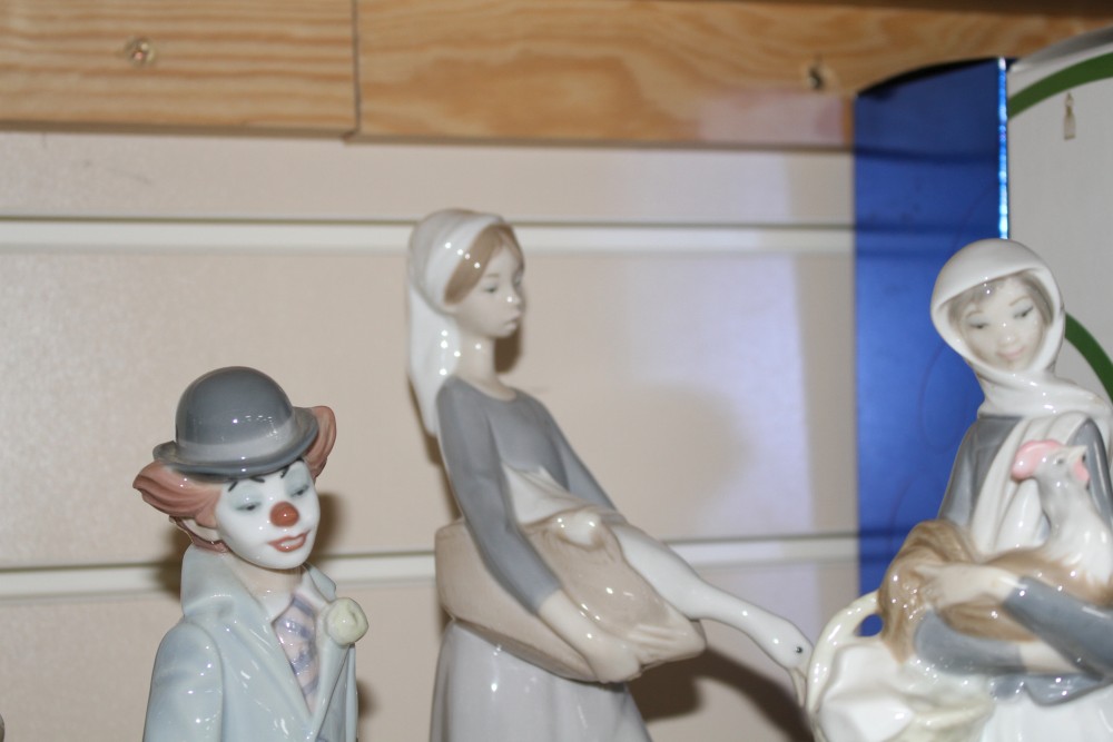 Five assorted Lladro figures and three Nao geese